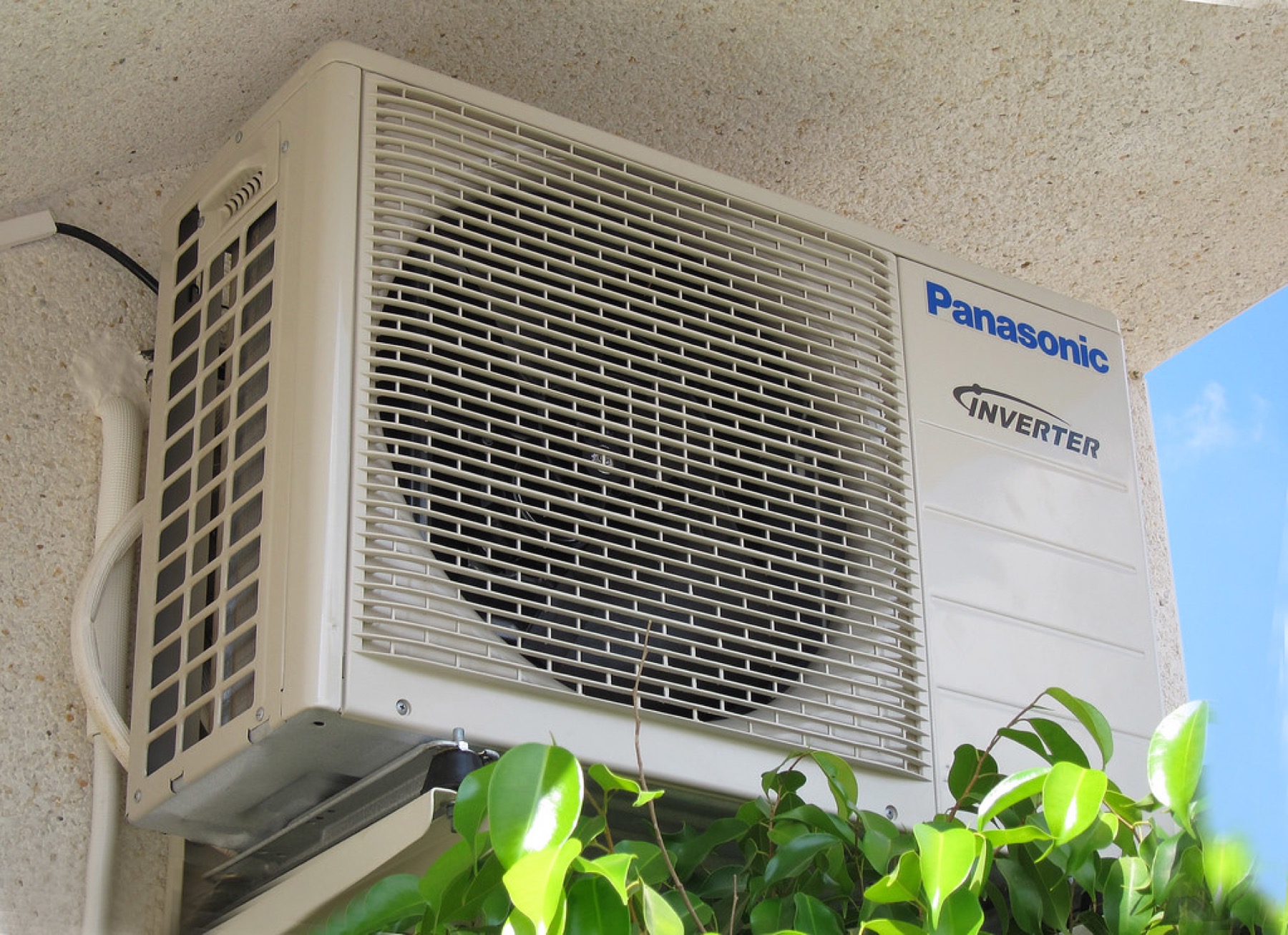 A Comfort Zone technician installing an HVAC system